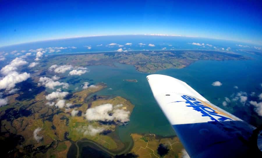 Auckland: 13000, 16000, or 18000-Foot Tandem Skydive - The aircraft climb above Auckland