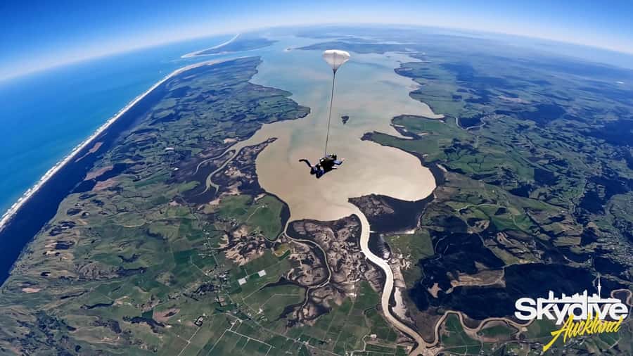 Auckland: 13000, 16000, or 18000-Foot Tandem Skydive - The door opens, and the freefall begins