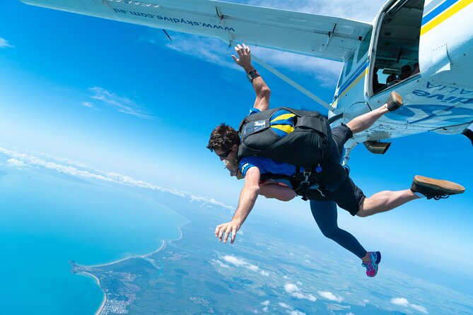 From Cairns: Tandem Skydive Experience over Mission Beach - The beach landing, meal, bikes, and swim time